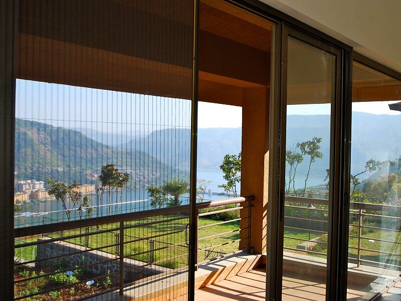 Framed insect screen installed on an enclosed terrace