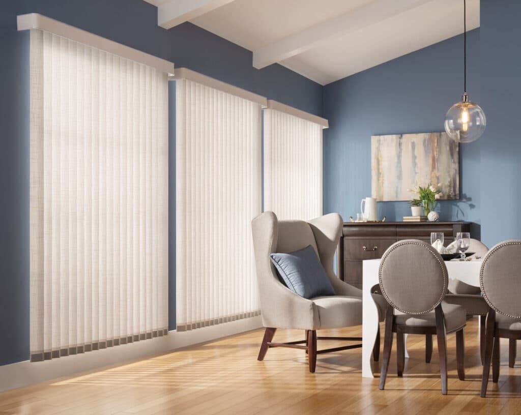 Vertical blinds installed in front of large windows